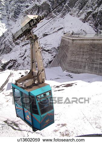 Switzerland, Europe, valais, wallis, Val D'Heremence, Dam Grande Dixence, 2, 365 metres, world's highest concrete dam, blue cable car View Large Photo Image Stock Photo - Switzerland, Europe, valais, wallis, Val D'Heremence, Dam Grande Dixence, 2, 365 metres, world's highest concrete dam, blue cable car. Fotosearch