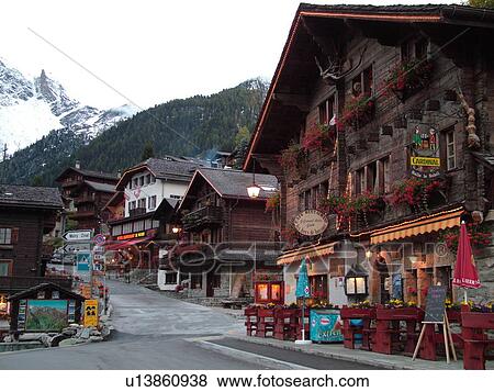 Stock Photo -  Switzerland, Europe, valais, wallis, Val d'Anniviers, Grimentz, alpine village, Les Becs de Bossons CafT Restaurant, Pension, outdoor cafT. Fotosearch