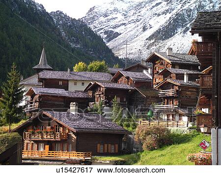 Switzerland, Europe, valais, wallis, Val d'Anniviers, Grimentz, alpine village, church, snow-capped mountain peaks View Large Photo Image Stock Photo - Switzerland, Europe, valais, wallis, Val d'Anniviers, Grimentz, alpine village, church, snow-capped mountain peaks. Fotosearch
