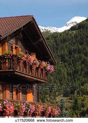 Switzerland, Europe, valais, wallis, Val d'Anniviers, St. Jean, chalet decorated with flowers View Large Photo Image Stock Photo - Switzerland, Europe, valais, wallis, Val d'Anniviers, St. Jean, chalet decorated with flowers. Fotosearch