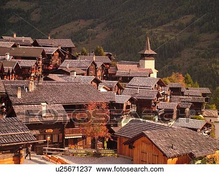 Switzerland, Europe, valais, wallis, Val d'Anniviers, Grimentz, alpine village, church, rooftops View Large Photo Image Stock Photo - Switzerland, Europe, valais, wallis, Val d'Anniviers, Grimentz, alpine village, church, rooftops. Fotosearch