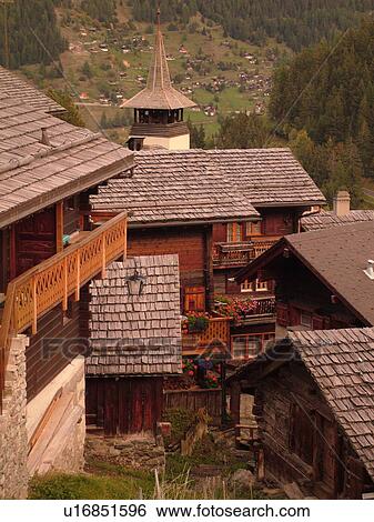 Stock Photograph -  Switzerland, Europe, valais, wallis, Val d'Anniviers, Grimentz, alpine village, old mountain chalets, rooftops. Fotosearch
