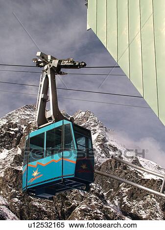 Stock Photography -  Switzerland, Europe, valais, wallis, Val D'Heremence, Dam Grande Dixence, blue cable car. Fotosearch