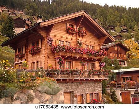 Stock Photography -  Switzerland, Europe, valais, wallis, Val d'Anniviers, Grimentz, alpine village, mountain chalets decorated with flowers. Fotosearch
