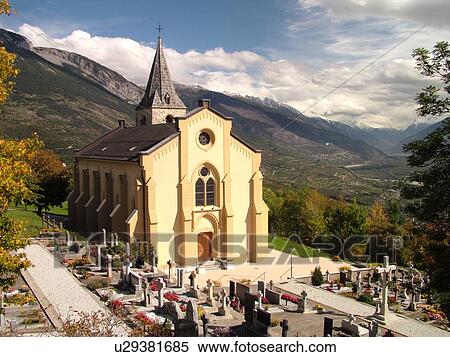 Stock Photography -  Switzerland, Europe, valais, wallis, Randogne, Rhone Valley, Fendant Wine Region, church, cemetery. Fotosearch