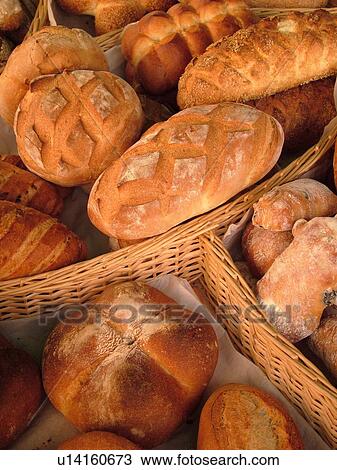 Stock Image -  Switzerland, Europe, Vaud, Morges, La Cote, downtown, City Market, bread, close-up. Fotosearch