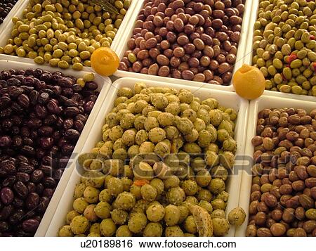 Stock Photograph -  Switzerland, Europe, Vaud, Morges, La Cote, downtown, City Market, olives, close-up. Fotosearch