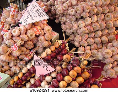 Stock Image -  Switzerland, Europe, Vaud, St. Cergues, La Desalpe, market, onions and garlic for sale festival. Fotosearch