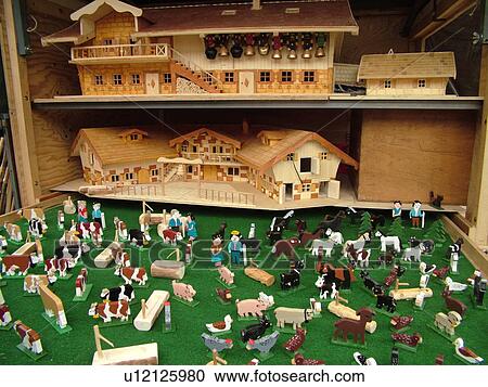 Stock Image -  Switzerland, Europe, Vaud, St. Cergues, La Desalpe, festival, toy chalet and farm animals on display. Fotosearch