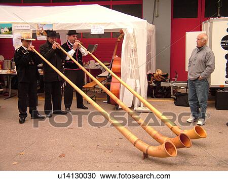 Switzerland, Europe, Vaud, St. Cergues, La Desalpe, festival, men playing alphorns View Large Photo Image Stock Image - Switzerland, Europe, Vaud, St. Cergues, La Desalpe, festival, men playing alphorns. Fotosearch