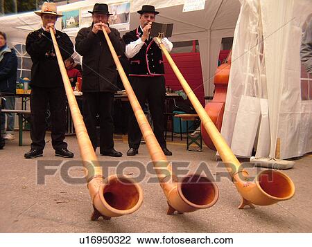 Switzerland, Europe, Vaud, St. Cergues, La Desalpe, festival, men playing alphorns View Large Photo Image Stock Image - Switzerland, Europe, Vaud, St. Cergues, La Desalpe, festival, men playing alphorns. Fotosearch