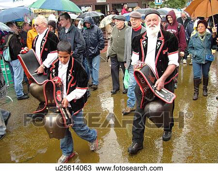 Switzerland, Europe, Vaud, St. Cergues, La Desalpe, festival, cow bell ringers parading through town View Large Photo Image Stock Image - Switzerland, Europe, Vaud, St. Cergues, La Desalpe, festival, cow bell ringers parading through town. Fotosearch