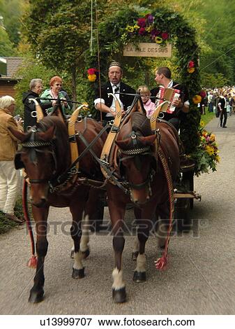 Switzerland, Europe, Vaud, St. Cergues, La Desalpe, festival, team of horses pulling a wagon View Large Photo Image Stock Photo - Switzerland, Europe, Vaud, St. Cergues, La Desalpe, festival, team of horses pulling a wagon. Fotosearch