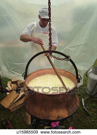 Switzerland, Europe, Vaud, St. Cergues, Desalpe, festival, cheese making demonstration, fondue, large kettle View Large Photo Image Stock Photo - Switzerland, Europe, Vaud, St. Cergues, Desalpe, festival, cheese making demonstration, fondue, large kettle . Fotosearch