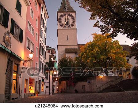 Picture -  Switzerland, Europe, Zurich, Zuerich, St. Peters Kirche, clock tower, evening. Fotosearch