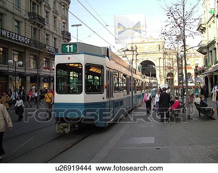 Switzerland, Europe, Zurich, Zuerich, downtown, Bahnhofstrasse, trolley, tram, commuters View Large Photo Image Picture - Switzerland, Europe, Zurich, Zuerich, downtown, Bahnhofstrasse, trolley, tram, commuters. Fotosearch