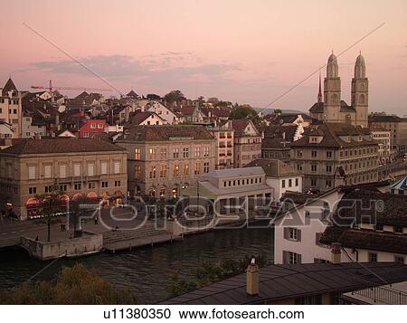 Switzerland, Europe, Zurich, Zuerich, Limmat River, Grossmunster Cathedral, Limmatquai, sunset, aerial view View Large Photo Image Stock Image - Switzerland, Europe, Zurich, Zuerich, Limmat River, Grossmunster Cathedral, Limmatquai, sunset, aerial view. Fotosearch