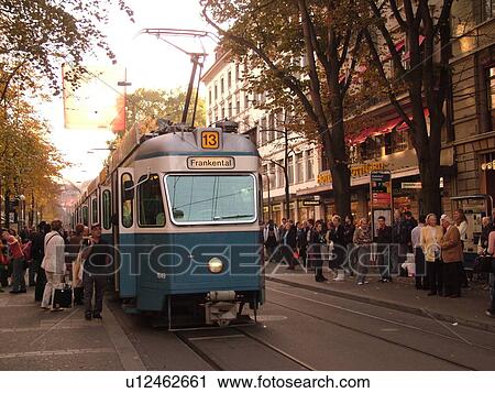 Switzerland, Europe, Zurich, Zuerich, downtown, Bahnhofstrasse, trolley, tram, commuters View Large Photo Image Stock Image - Switzerland, Europe, Zurich, Zuerich, downtown, Bahnhofstrasse, trolley, tram, commuters. Fotosearch