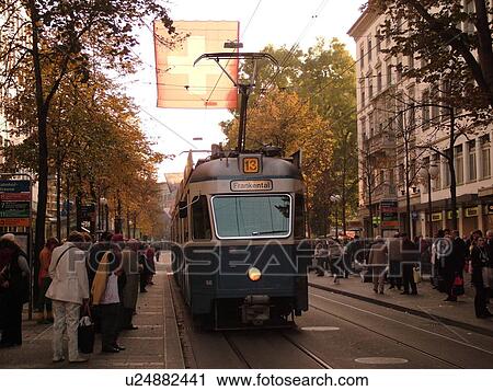 Switzerland, Europe, Zurich, Zuerich, downtown, Bahnhofstrasse, trolley, tram, commuters View Large Photo Image Stock Image - Switzerland, Europe, Zurich, Zuerich, downtown, Bahnhofstrasse, trolley, tram, commuters. Fotosearch