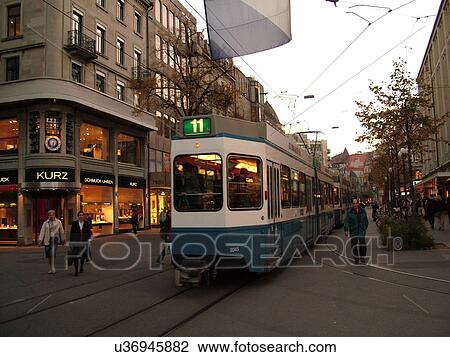 Stock Image -  Switzerland, Europe, Zurich, Zuerich, downtown, Bahnhofstrasse, trolley, tram. Fotosearch