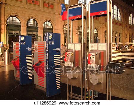 Switzerland, Europe, Zurich, Zuerich, downtown, train station, ticket machines, telephones View Large Photo Image Stock Photo - Switzerland, Europe, Zurich, Zuerich, downtown, train station, ticket machines, telephones. Fotosearch