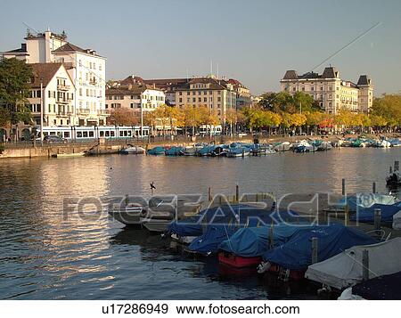Stock Photo -  Switzerland, Europe, Zurich, Zuerich, Limmat River, marina, boats, waterfront. Fotosearch