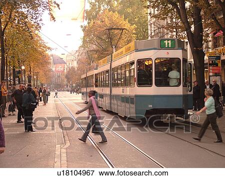 Switzerland, Europe, Zurich, Zuerich, downtown, Bahnhofstrasse, trolley, tram, commuters View Large Photo Image Stock Photo - Switzerland, Europe, Zurich, Zuerich, downtown, Bahnhofstrasse, trolley, tram, commuters. Fotosearch
