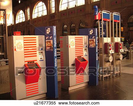 Switzerland, Europe, Zurich, Zuerich, downtown, train station, ticket machines, telephones View Large Photo Image Stock Photography - Switzerland, Europe, Zurich, Zuerich, downtown, train station, ticket machines, telephones. Fotosearch