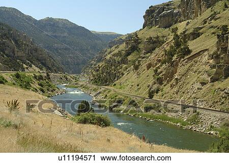 Stock Image -  Thermopolis, WY, Wyoming, Wind River, Wind River Canyon. Fotosearch