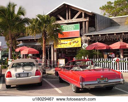 Venice, FL, Florida, Englewood, Coconut Grove Restaurant, shops, old red Elderado Cadillac convertible View Large Photo Image Stock Photo - Venice, FL, Florida, Englewood, Coconut Grove Restaurant, shops, old red Elderado Cadillac convertible. Fotosearch