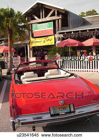 Venice, FL, Florida, Englewood, Coconut Grove Restaurant, shops, old red Elderado Cadillac convertible View Large Photo Image Stock Photography - Venice, FL, Florida, Englewood, Coconut Grove Restaurant, shops, old red Elderado Cadillac convertible. Fotosearch