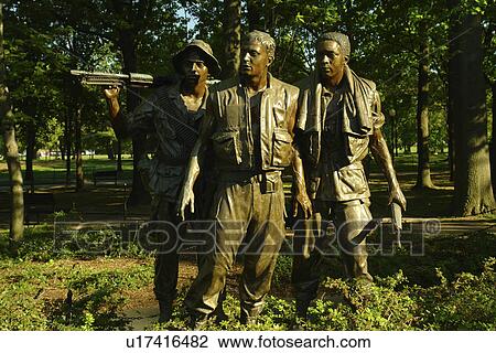 Stock Image -  Washington DC, D. C District of Columbia, 3 Servicemen Vietnam Veterans War Memorial, National Mall, Memorial Parks, Nation's Capital. Fotosearch