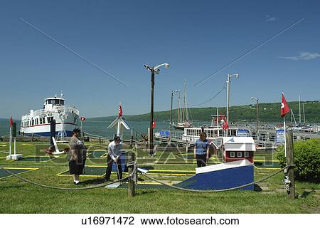 Watkins Glen, NY, New York, Finger Lakes, Seneca Lake, people playing mini golf on the waterfront View Large Photo Image Stock Image - Watkins Glen, NY, New York, Finger Lakes, Seneca Lake, people playing mini golf on the waterfront. Fotosearch