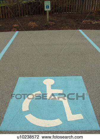 Stock Image -  West Chester, PA, Pennsylvania, Hershey's Mill Chester County, parking lot, handicapped parking spaces, wheelchair access, blue and white. Fotosearch