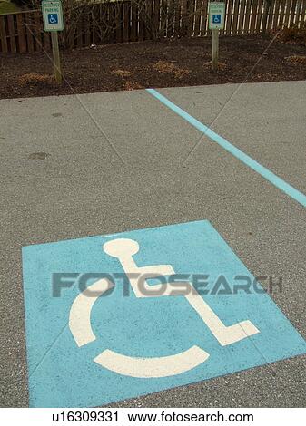 Stock Image -  West Chester, PA, Pennsylvania, Hershey's Mill Chester County, parking lot, handicapped parking spaces, wheelchair access, blue and white. Fotosearch