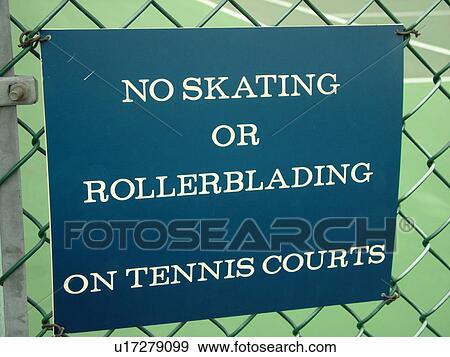 Stock Photo -  West Chester, PA, Pennsylvania, Hershey's Mill Chester County, tennis courts, restrictions, sign on chain link fence, no skateboards, no skating. Fotosearch