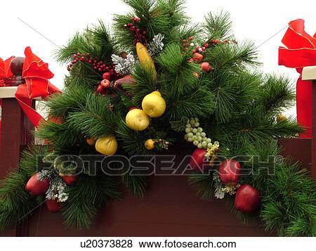 Stock Photo -  West Chester, PA, Pennsylvania, Hershey's Mill Chester County, Christmas decorations, Village of Franklin entrance sign decorated for the Christmas holidays. Fotosearch