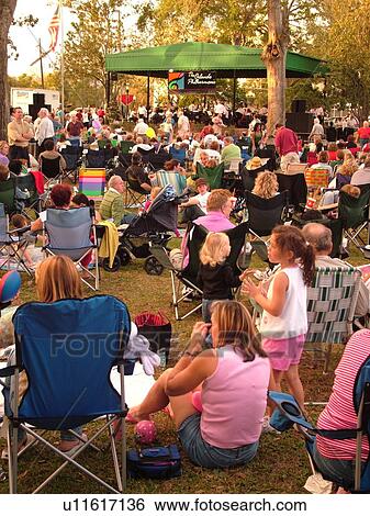 Stock Photograph -  Winter Park, FL, Florida, Orlando, downtown, Sunday Music in the Park, crowd of people. Fotosearch