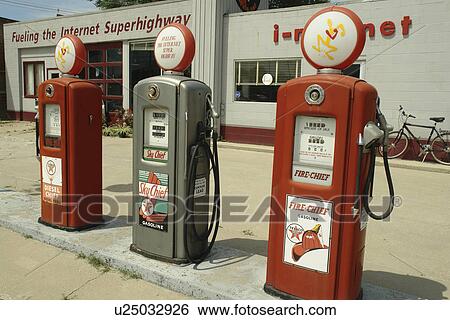 Stock Photograph -  Winterset, Madison County, IA, Iowa, Old gas station, internet, gas pumps. Fotosearch