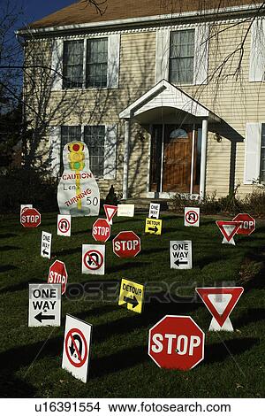 Allentown, PA, Pennsylvania, signs in a front yard, stop signs, no u-turn, detour, one-way View Large Photo Image Picture - Allentown, PA, Pennsylvania, signs in a front yard, stop signs, no u-turn, detour, one-way. Fotosearch