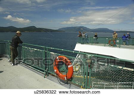 Stock Image -  Anacortes, WA, Washington, Puget Sound, San Juan Islands, Washington State ferry to British Columbia, Canada. Fotosearch
