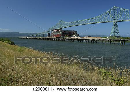 Stock Photo -  Astoria, OR, Oregon, Pacific Ocean, Pacific Coast Scenic Byway, Rt Route, Highway 101, Columbia River, Riverfront, Columbia & Astoria Megler Bridge. Fotosearch