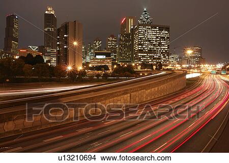 Picture -  Atlanta, GA, Georgia, Downtown Skyline, I-75, I-85, expressway, interstate, roads, evening. Fotosearch