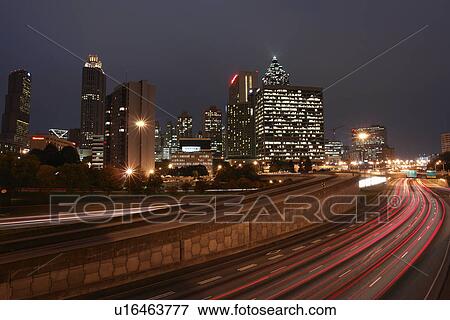 Stock Photo -  Atlanta, GA, Georgia, Downtown Skyline, I-75, I-85, expressway, interstate, roads, evening. Fotosearch