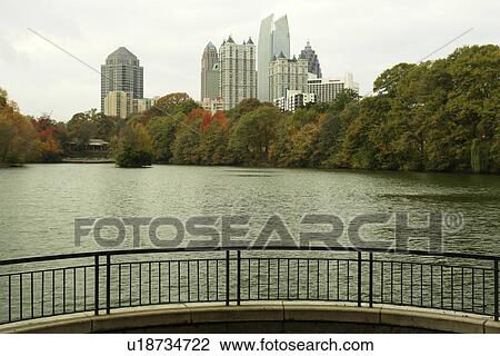 Stock Image -  Atlanta, GA, Georgia, Piedmont Park, Midtown skyline, autumn. Fotosearch