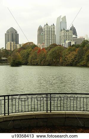 Stock Image -  Atlanta, GA, Georgia, Piedmont Park, Midtown skyline, autumn. Fotosearch