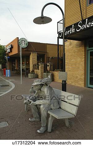 Bend, OR, Oregon, downtown, statue of a man sitting on a bench with two ducks View Large Photo Image Picture - Bend, OR, Oregon, downtown, statue of a man sitting on a bench with two ducks. Fotosearch