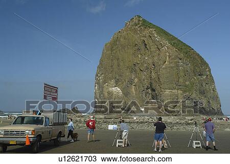 Stock Image -  Cannon Beach, OR, Oregon, Pacific Ocean, Pacific Coast Scenic Byway, Rt Route, Highway 101, Cannon Beach, Haystack Rock. Fotosearch