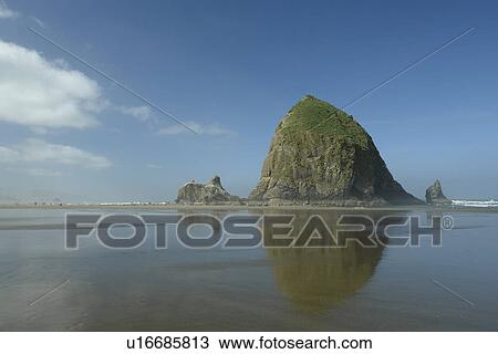 Stock Image -  Cannon Beach, OR, Oregon, Pacific Ocean, Pacific Coast Scenic Byway, Rt Route, Highway 101, Cannon Beach, Haystack Rock. Fotosearch