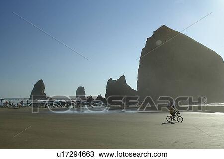 Stock Image -  Cannon Beach, OR, Oregon, Pacific Ocean, Pacific Coast Scenic Byway, Rt Route, Highway 101, Cannon Beach, Haystack Rock. Fotosearch